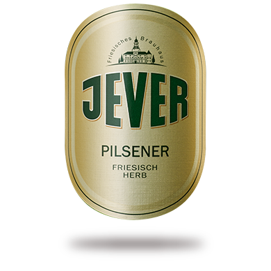 Eine ovale goldene Bierdose steht auf einer roten Oberfläche.